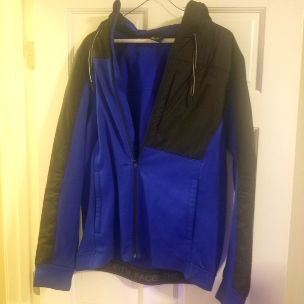 The North face blue wind breaker jacket